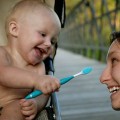 baby with toothbrush